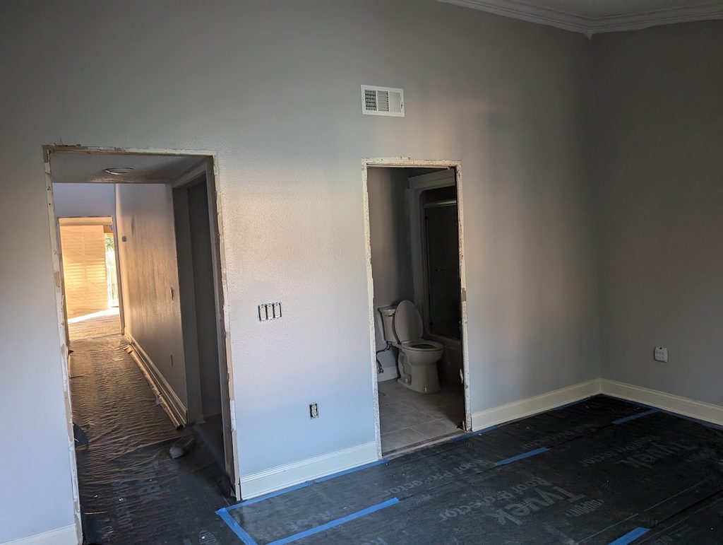Dated two-tier kitchen peninsula before the facelift