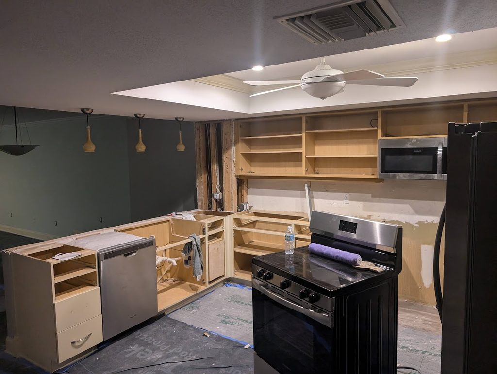 Dated two-tier kitchen peninsula before the facelift