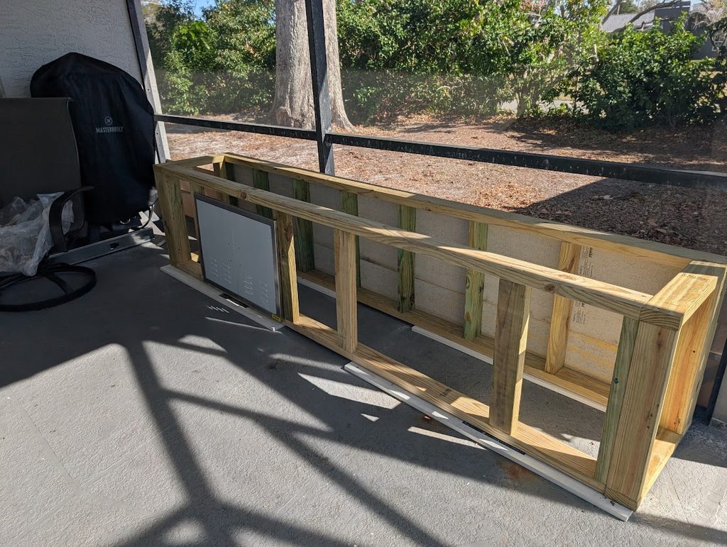 Existing back patio before the outdoor kitchen build