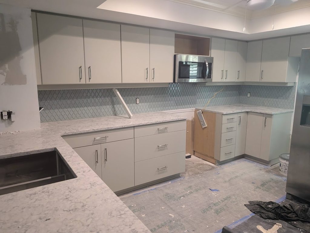 Dated two-tier kitchen peninsula before the facelift