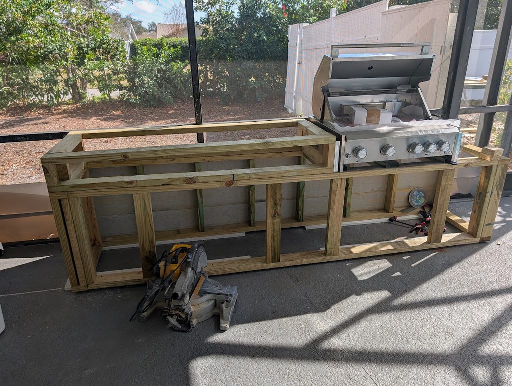 Existing back patio before the outdoor kitchen build